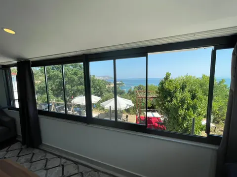5 No'lu daire — bahçe ve deniz manzarası